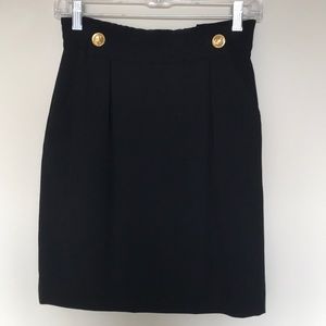 Dana Buchman 100% wool. lined. Decorative gold buttons. Elastic back waistband.